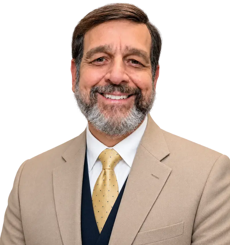 G. Mick Smith, PhD, Authority Architect and thought leadership consultant, smiling in a tan suit
